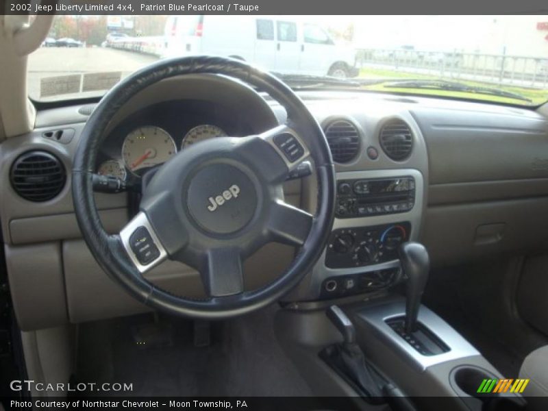 Patriot Blue Pearlcoat / Taupe 2002 Jeep Liberty Limited 4x4