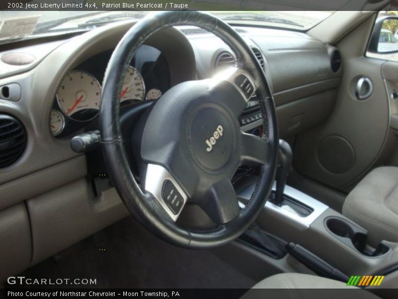 Patriot Blue Pearlcoat / Taupe 2002 Jeep Liberty Limited 4x4