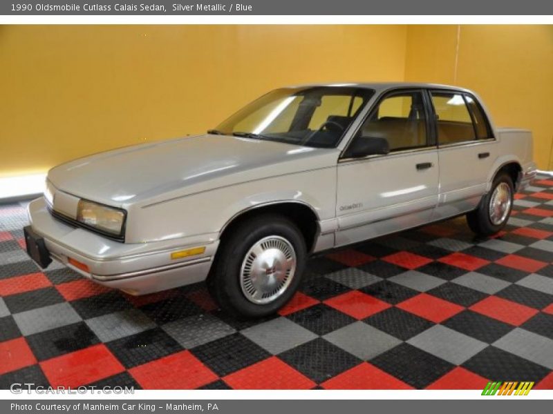 Silver Metallic / Blue 1990 Oldsmobile Cutlass Calais Sedan