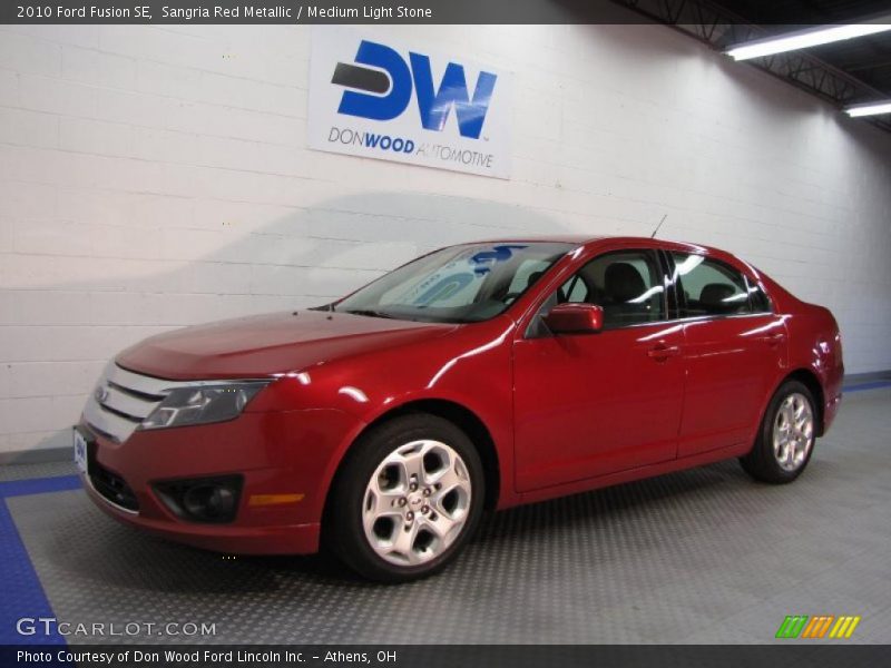 Sangria Red Metallic / Medium Light Stone 2010 Ford Fusion SE