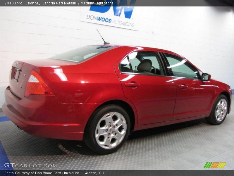 Sangria Red Metallic / Medium Light Stone 2010 Ford Fusion SE