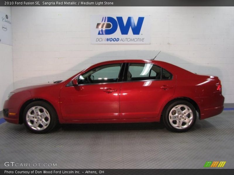 Sangria Red Metallic / Medium Light Stone 2010 Ford Fusion SE