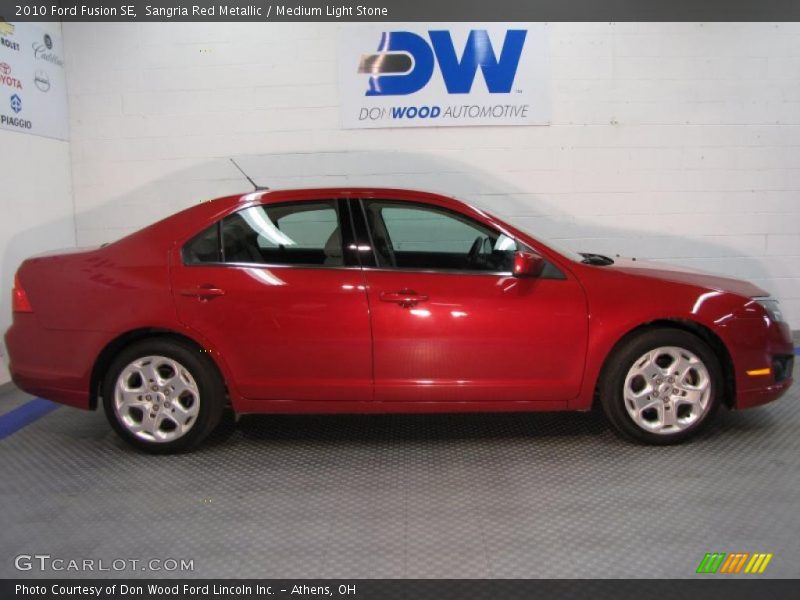 Sangria Red Metallic / Medium Light Stone 2010 Ford Fusion SE