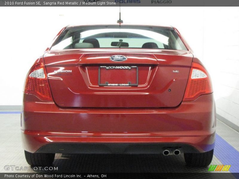Sangria Red Metallic / Medium Light Stone 2010 Ford Fusion SE