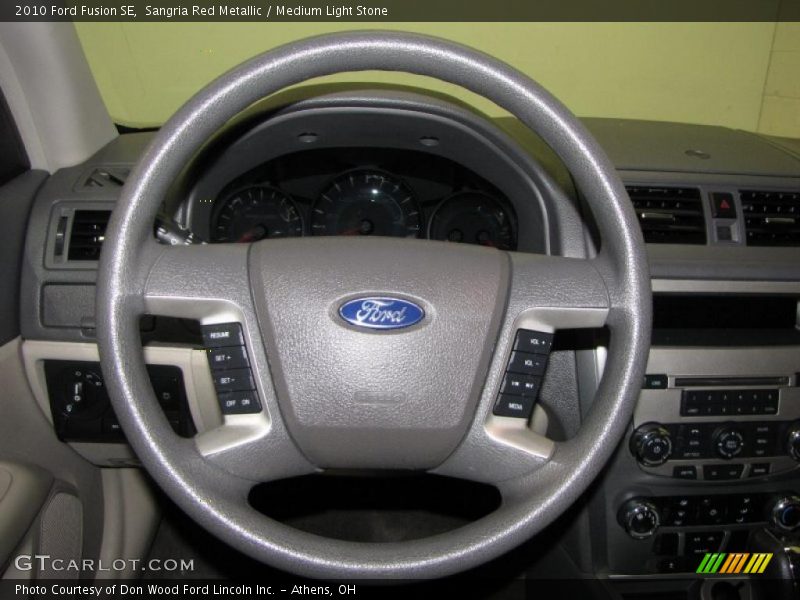 Sangria Red Metallic / Medium Light Stone 2010 Ford Fusion SE