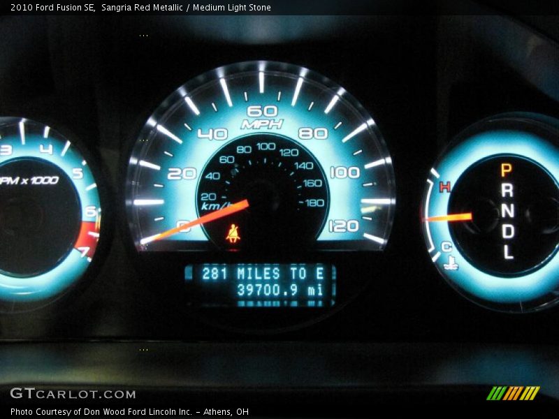 Sangria Red Metallic / Medium Light Stone 2010 Ford Fusion SE