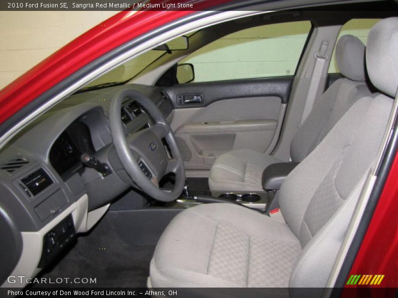 Sangria Red Metallic / Medium Light Stone 2010 Ford Fusion SE