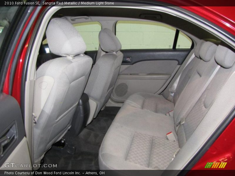 Sangria Red Metallic / Medium Light Stone 2010 Ford Fusion SE