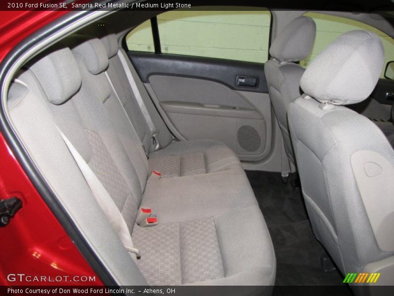 Sangria Red Metallic / Medium Light Stone 2010 Ford Fusion SE