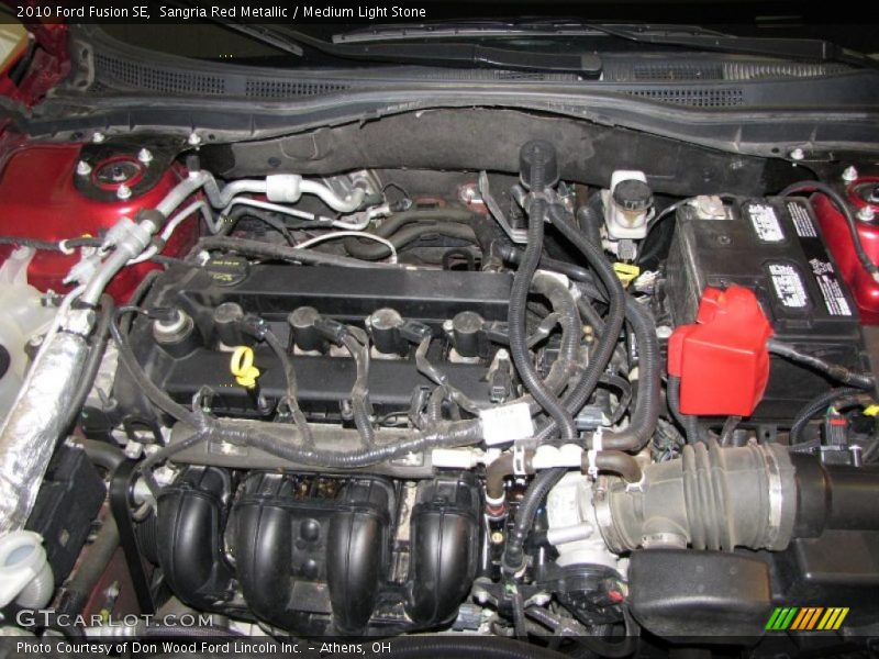 Sangria Red Metallic / Medium Light Stone 2010 Ford Fusion SE