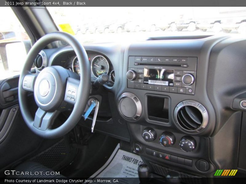 Dashboard of 2011 Wrangler Sport 4x4