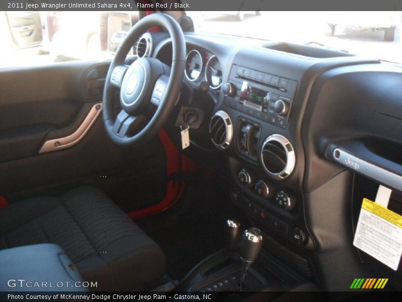 Flame Red / Black 2011 Jeep Wrangler Unlimited Sahara 4x4
