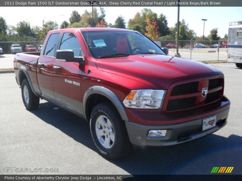 Front 3/4 View of 2011 Ram 1500 SLT Outdoorsman Quad Cab 4x4
