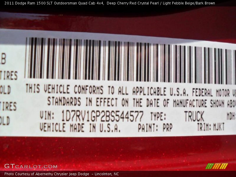 Deep Cherry Red Crystal Pearl / Light Pebble Beige/Bark Brown 2011 Dodge Ram 1500 SLT Outdoorsman Quad Cab 4x4