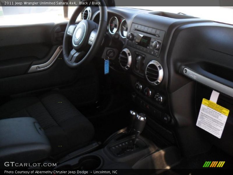 Black / Black 2011 Jeep Wrangler Unlimited Sahara 4x4
