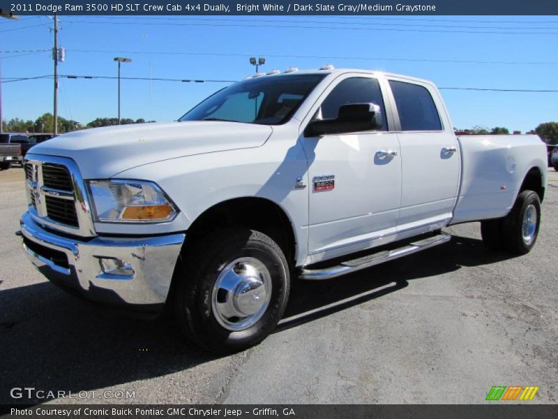 Front 3/4 View of 2011 Ram 3500 HD SLT Crew Cab 4x4 Dually