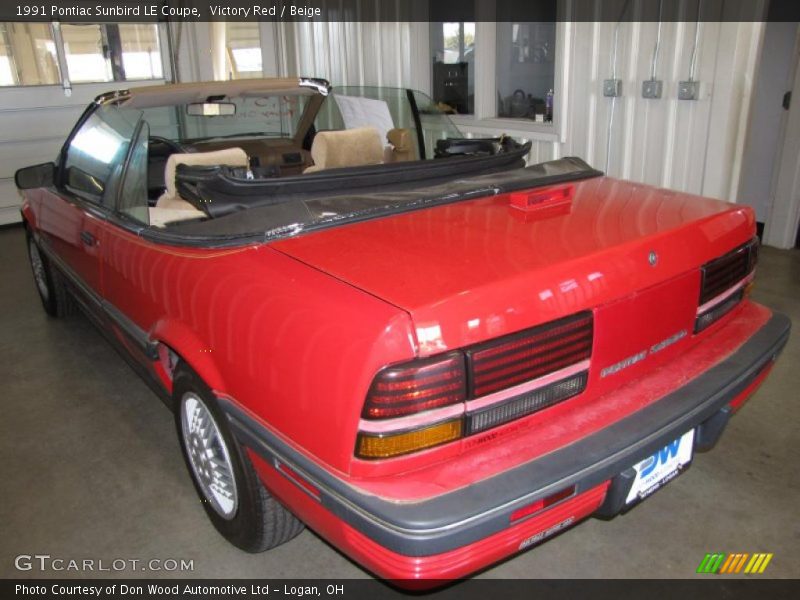 Victory Red / Beige 1991 Pontiac Sunbird LE Coupe