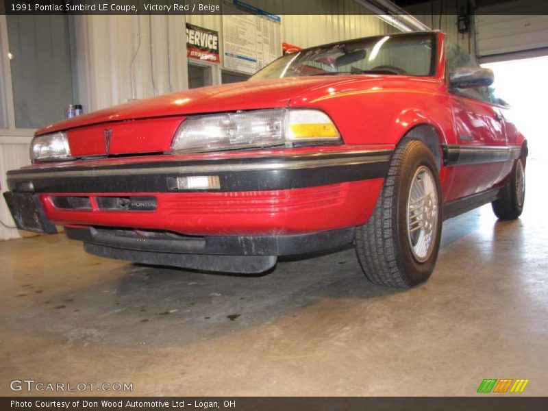 Victory Red / Beige 1991 Pontiac Sunbird LE Coupe