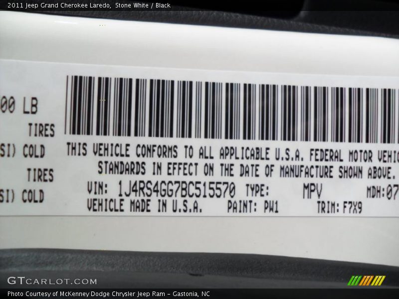 Stone White / Black 2011 Jeep Grand Cherokee Laredo