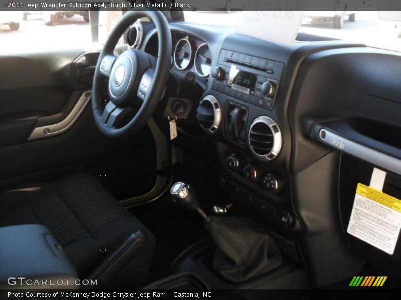 Bright Silver Metallic / Black 2011 Jeep Wrangler Rubicon 4x4
