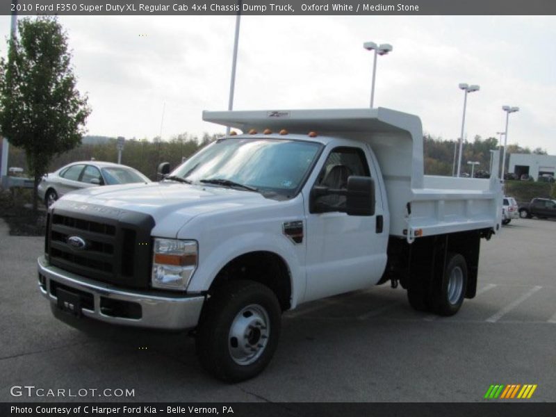 Front 3/4 View of 2010 F350 Super Duty XL Regular Cab 4x4 Chassis Dump Truck