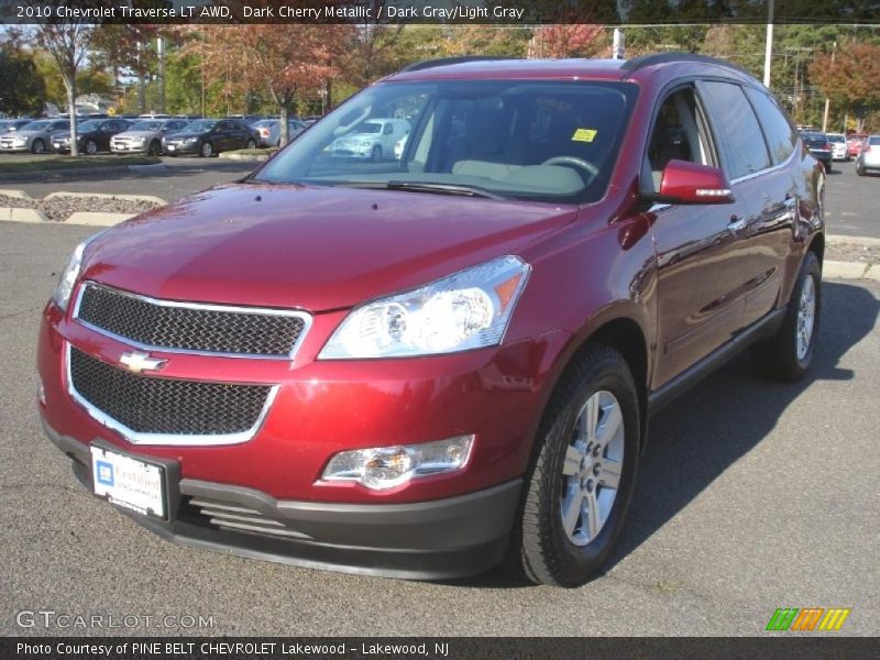 Dark Cherry Metallic / Dark Gray/Light Gray 2010 Chevrolet Traverse LT AWD