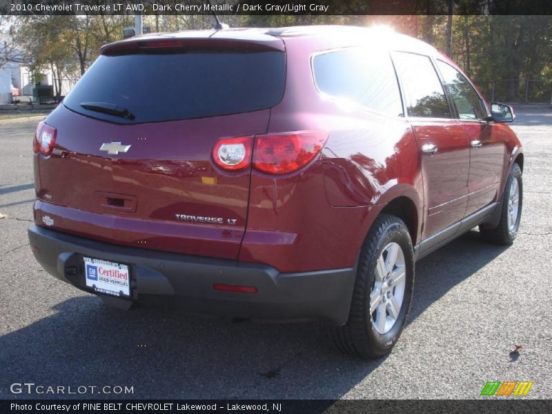 Dark Cherry Metallic / Dark Gray/Light Gray 2010 Chevrolet Traverse LT AWD