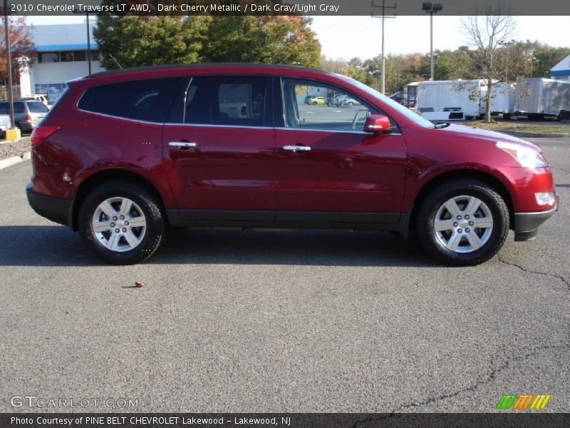 Dark Cherry Metallic / Dark Gray/Light Gray 2010 Chevrolet Traverse LT AWD