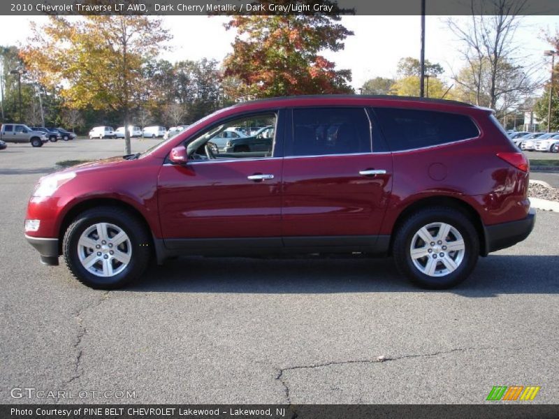 Dark Cherry Metallic / Dark Gray/Light Gray 2010 Chevrolet Traverse LT AWD