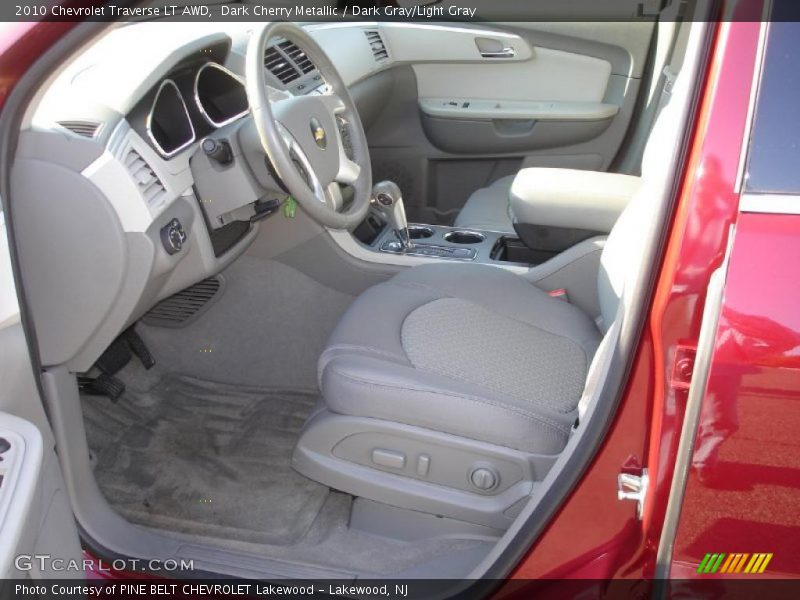 Dark Cherry Metallic / Dark Gray/Light Gray 2010 Chevrolet Traverse LT AWD
