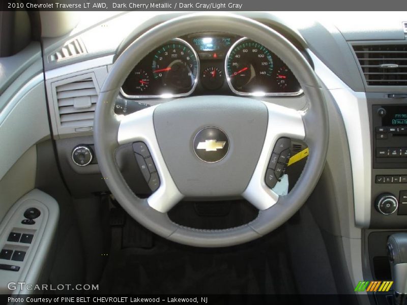 Dark Cherry Metallic / Dark Gray/Light Gray 2010 Chevrolet Traverse LT AWD