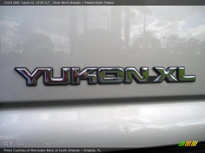  2004 Yukon XL 1500 SLT Logo