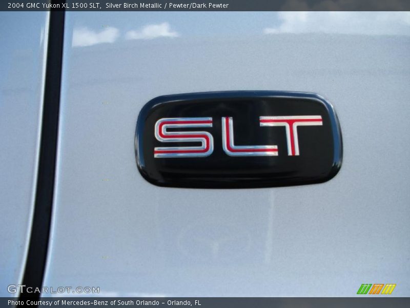  2004 Yukon XL 1500 SLT Logo