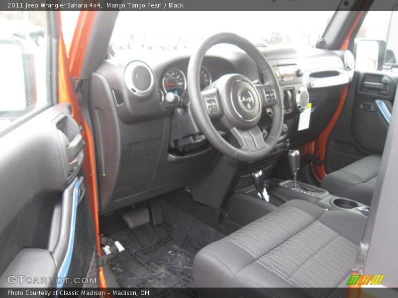 Mango Tango Pearl / Black 2011 Jeep Wrangler Sahara 4x4