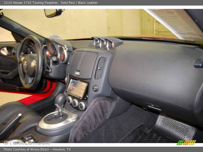 Dashboard of 2010 370Z Touring Roadster