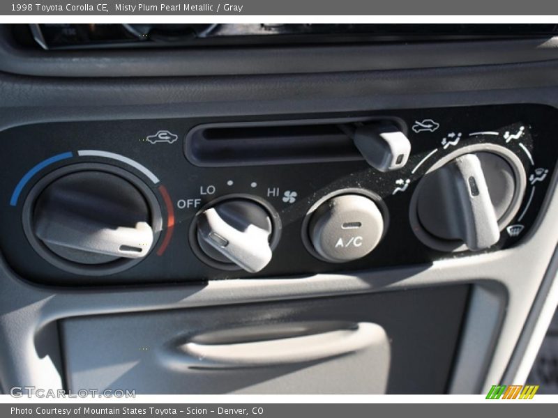 Misty Plum Pearl Metallic / Gray 1998 Toyota Corolla CE
