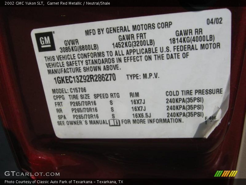 Garnet Red Metallic / Neutral/Shale 2002 GMC Yukon SLT