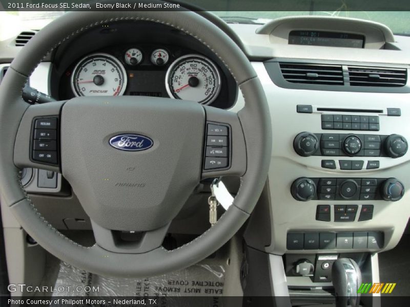 Ebony Black / Medium Stone 2011 Ford Focus SEL Sedan