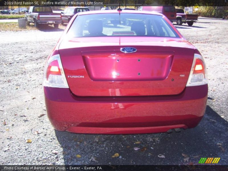 Redfire Metallic / Medium Light Stone 2009 Ford Fusion SE