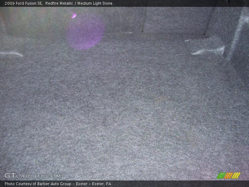 Redfire Metallic / Medium Light Stone 2009 Ford Fusion SE