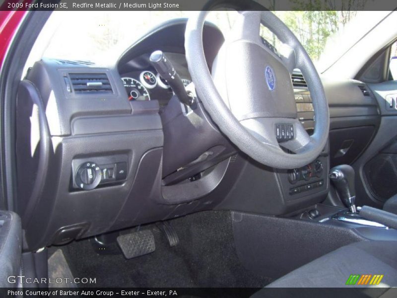 Redfire Metallic / Medium Light Stone 2009 Ford Fusion SE