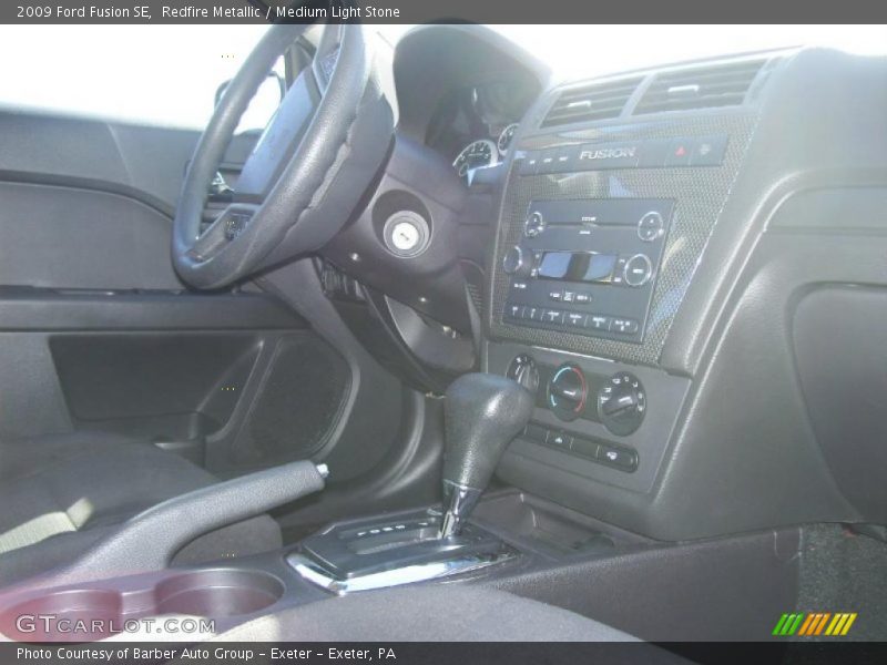 Redfire Metallic / Medium Light Stone 2009 Ford Fusion SE