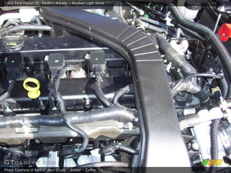 Redfire Metallic / Medium Light Stone 2009 Ford Fusion SE