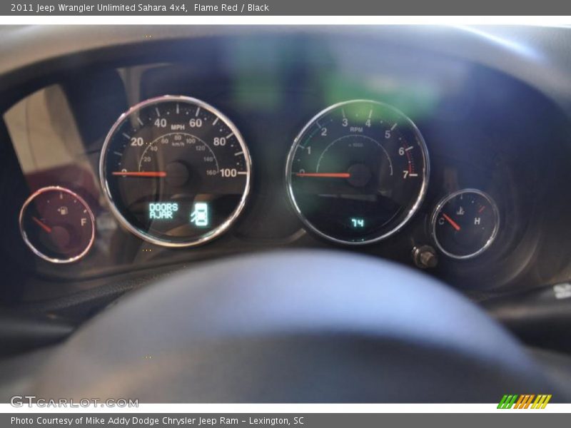 Flame Red / Black 2011 Jeep Wrangler Unlimited Sahara 4x4