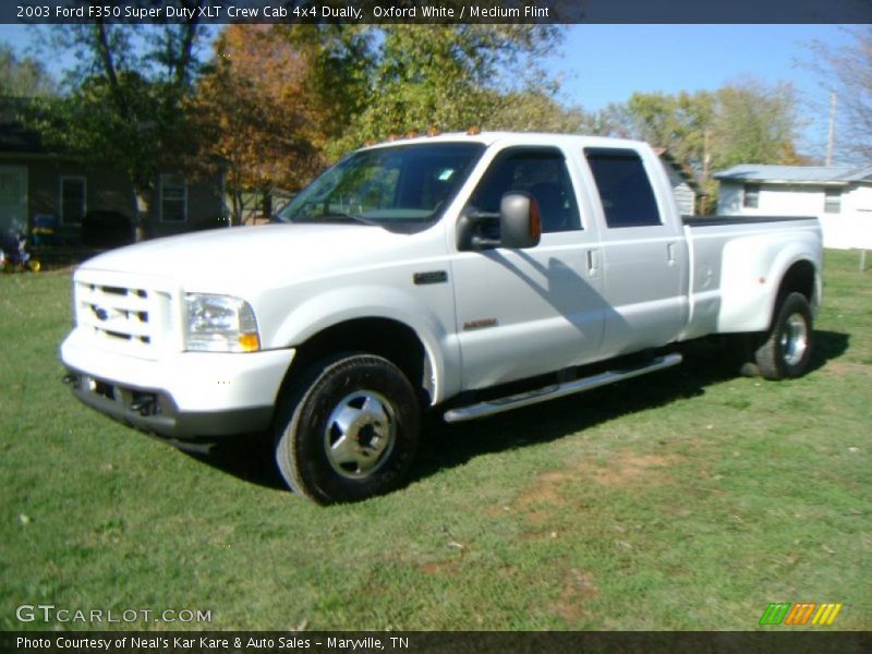 Front 3/4 View of 2003 F350 Super Duty XLT Crew Cab 4x4 Dually