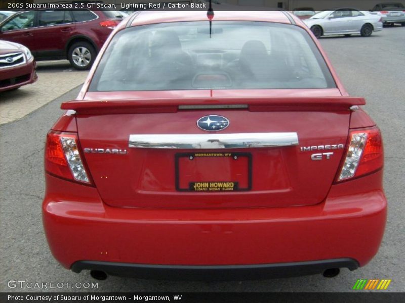 Lightning Red / Carbon Black 2009 Subaru Impreza 2.5 GT Sedan