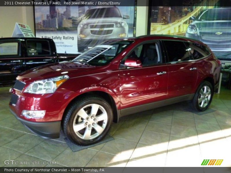 Red Jewel Metallic / Ebony/Ebony 2011 Chevrolet Traverse LT AWD