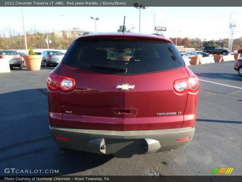 Red Jewel Metallic / Ebony/Ebony 2011 Chevrolet Traverse LT AWD