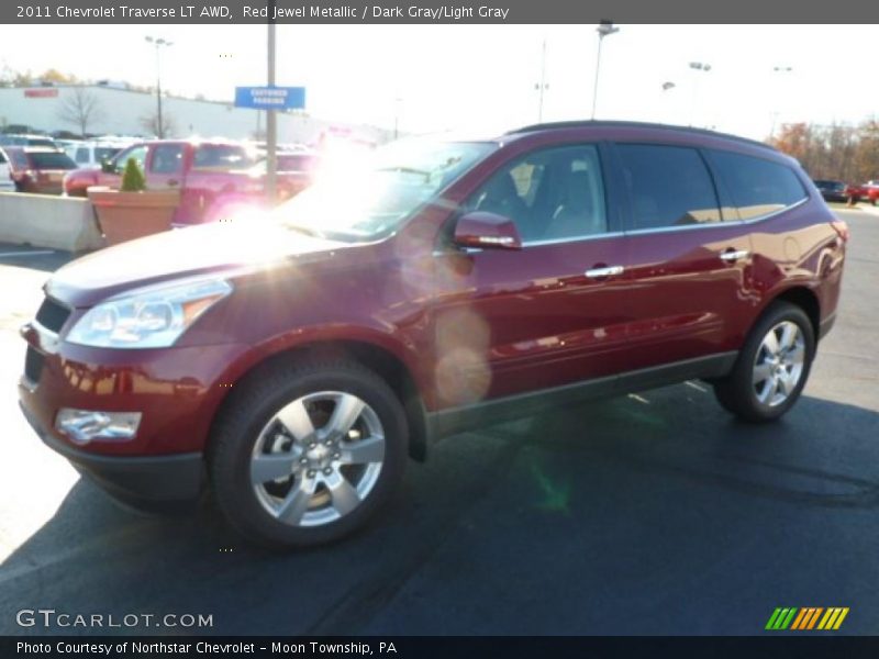 Red Jewel Metallic / Dark Gray/Light Gray 2011 Chevrolet Traverse LT AWD