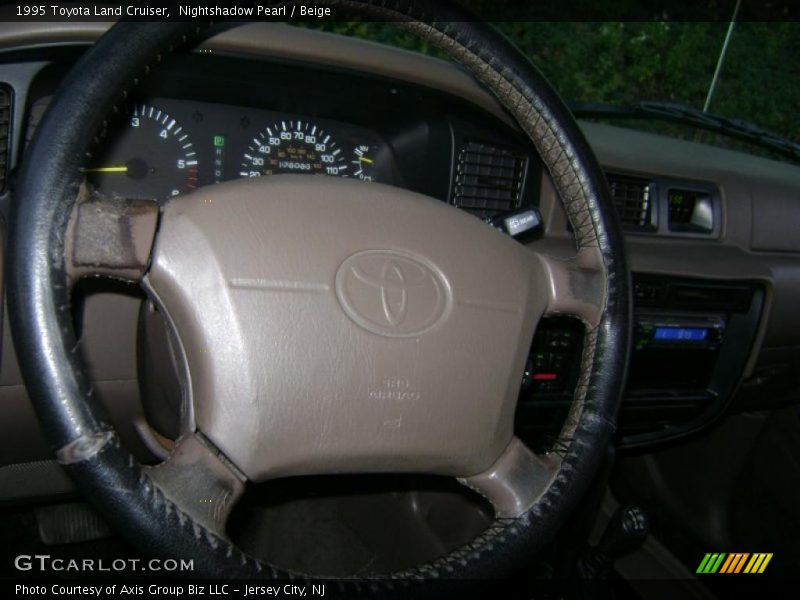 Nightshadow Pearl / Beige 1995 Toyota Land Cruiser